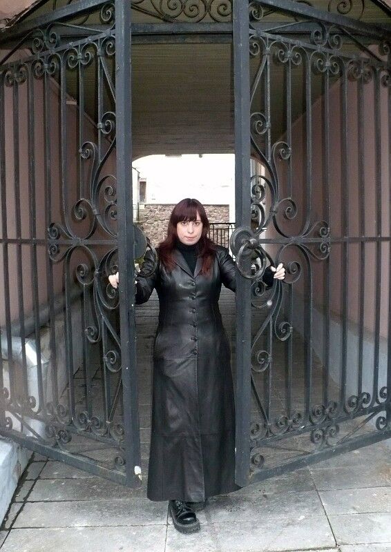 Brunette Woman in leather coat