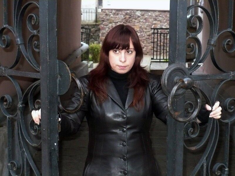 Brunette Woman in leather coat