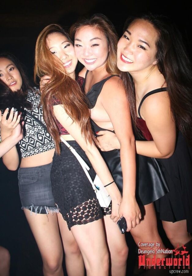 Asian clubbing upskirt. Almost nip slip.