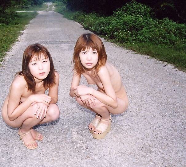 Two Japanese babes nude outdoors