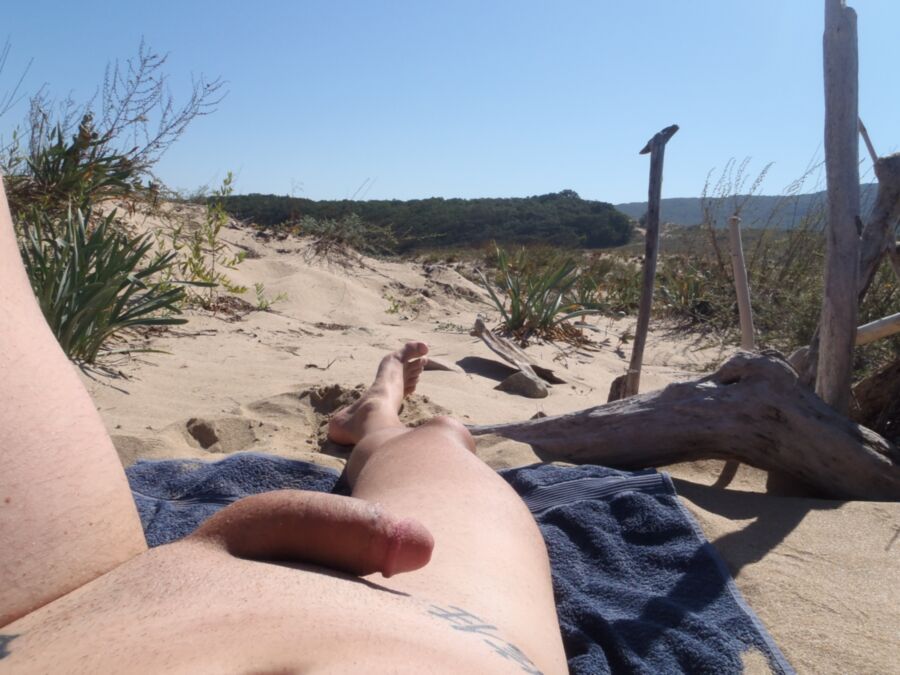 Naked on public beach