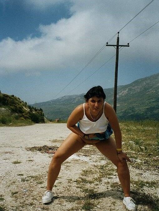 greek girl on holidays posing, pissing etc