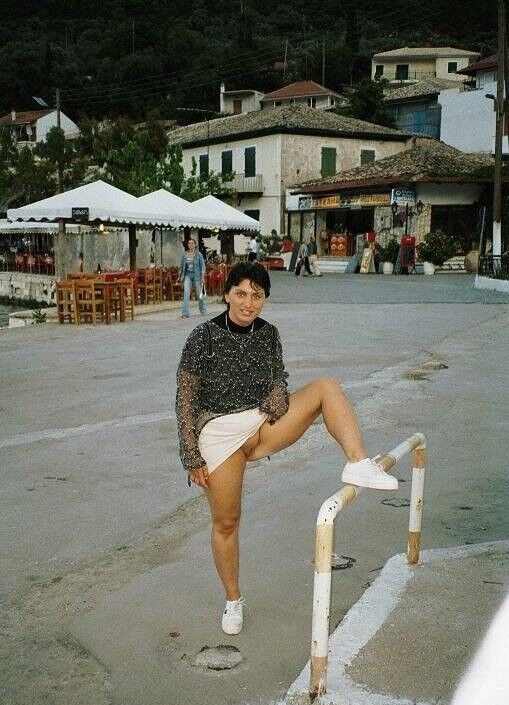 greek girl on holidays posing, pissing etc