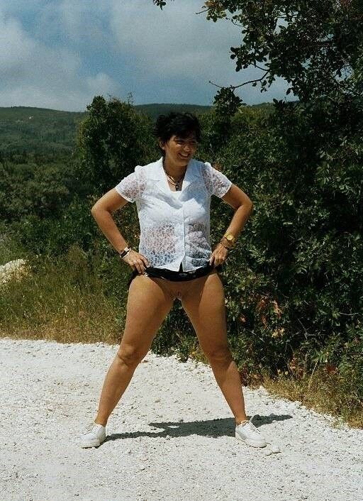 greek girl on holidays posing, pissing etc