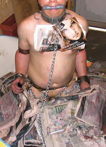 Chained Up in a Pool of Wet Newspaper