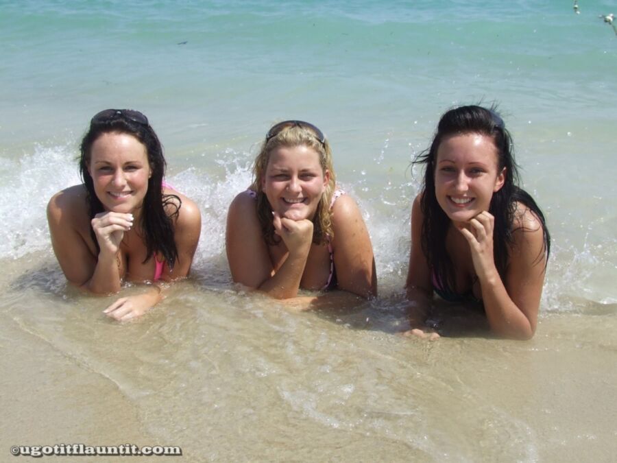 Niki and her friend lose their bikini tops at the beach