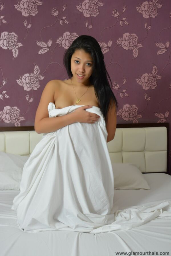 young thai beauty and a very lucky sheet