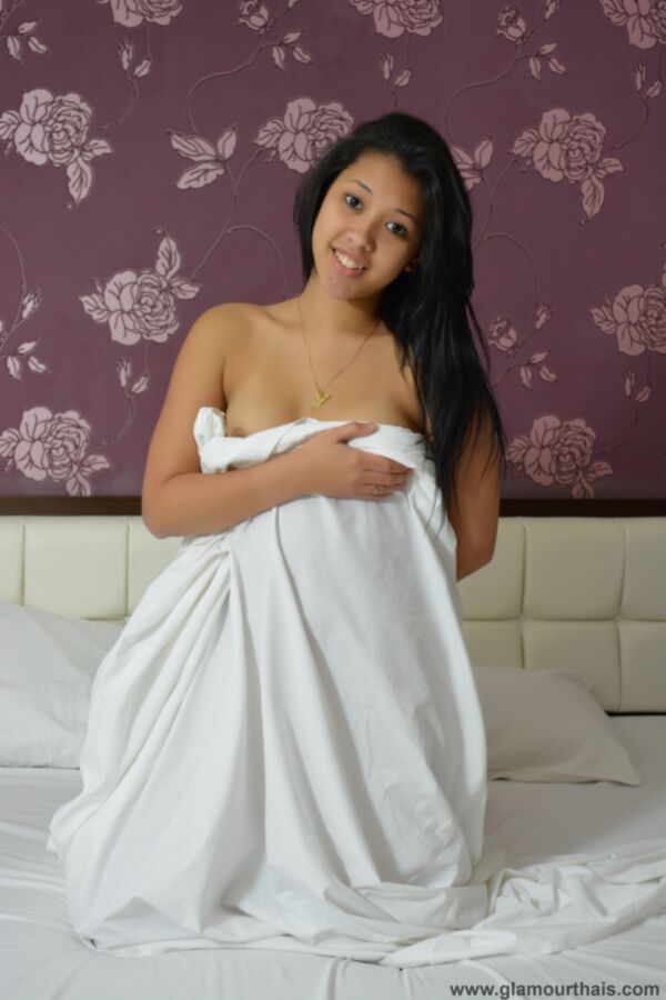 young thai beauty and a very lucky sheet