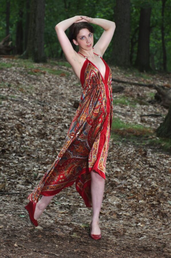 Short haired cutie outdoor in red dress