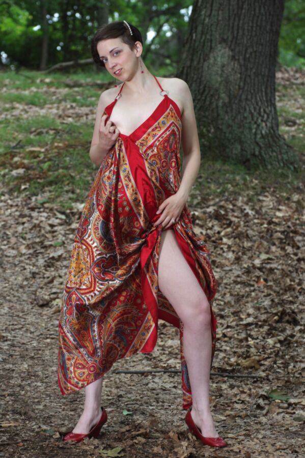 Short haired cutie outdoor in red dress