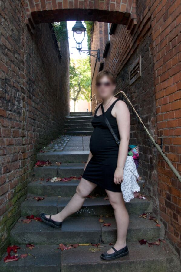 My preggo slave on vacation with black dressed outdoor and no...