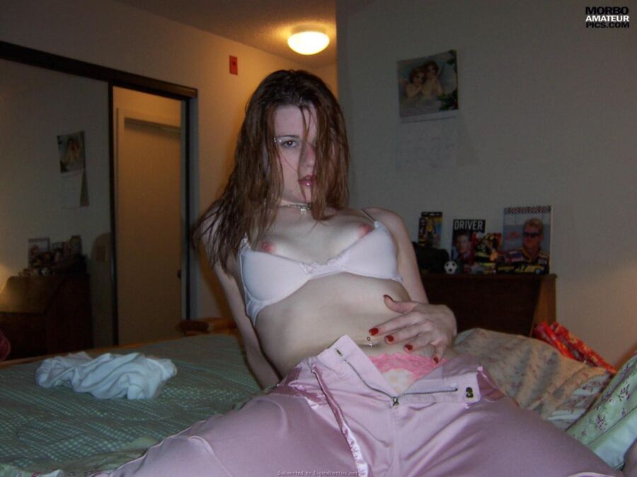 REDHEAD IN PINK PLAYS WITH HER PINK