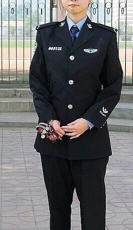 Wang Meng Xi - oficial de policía chino