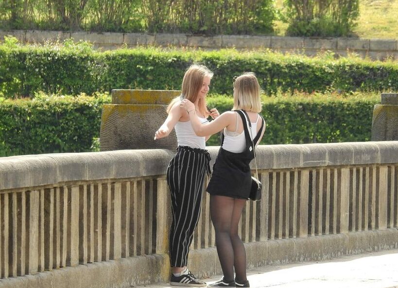 Two hot french candid friends in the parc