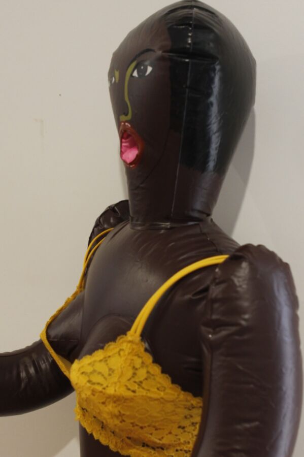 Black inflatable love doll strips and fucks