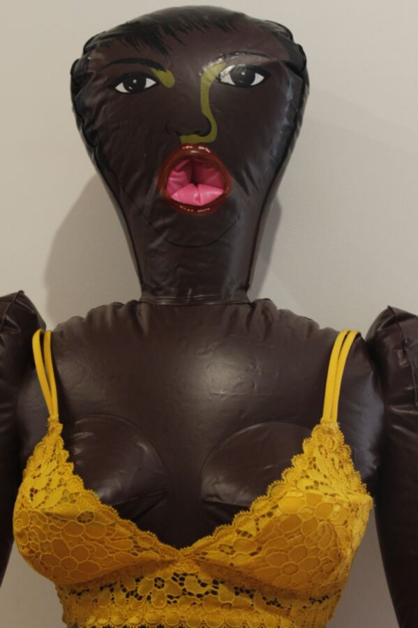 Black inflatable love doll strips and fucks