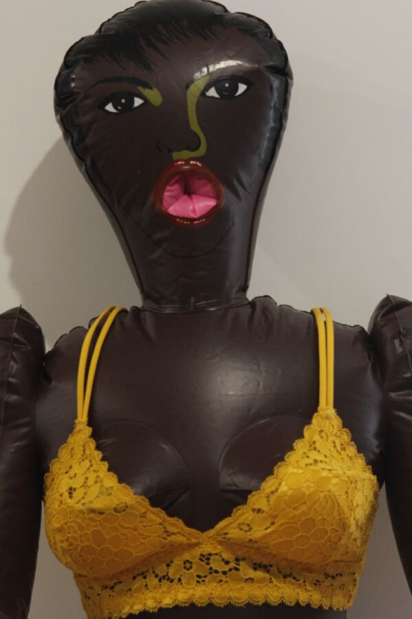 Black inflatable love doll strips and fucks