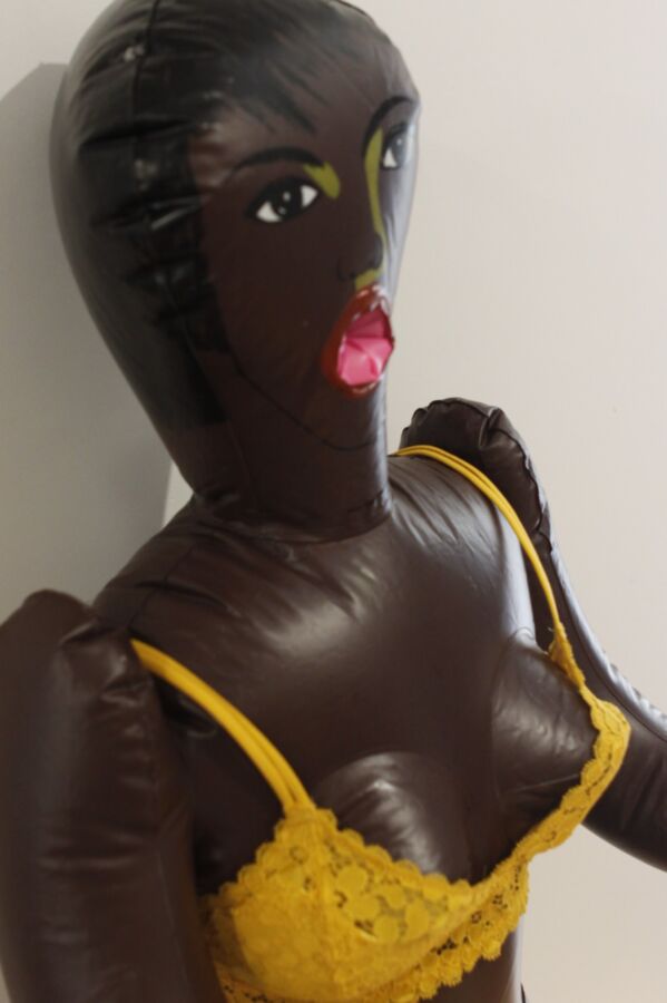 Black inflatable love doll strips and fucks