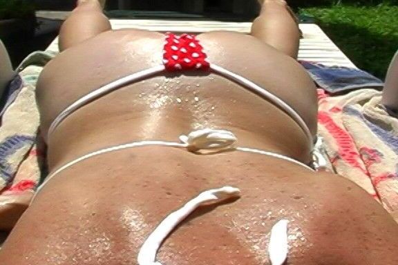 Spreading Suntan Oil On My Juicy Mature Ass