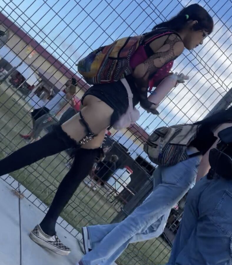 Latina goth girl showing off her cheeks