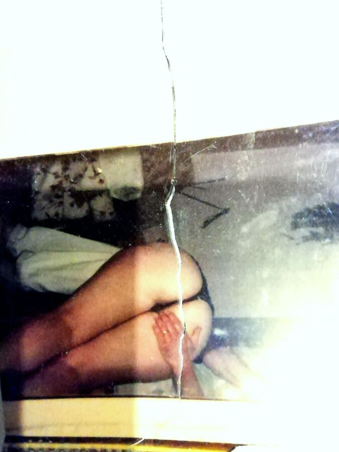 Old Polaroids of my wife being spanked