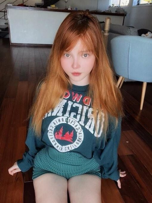 Redheads clothed but sexy 8