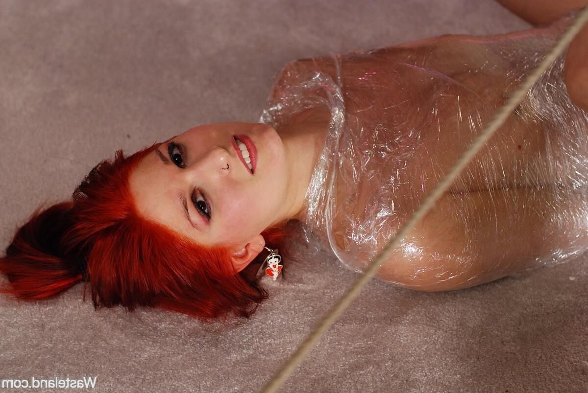 BDSM   Plastic Wrapped Redhead