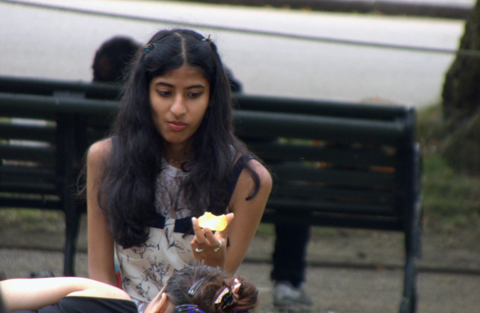 Indian girl munching