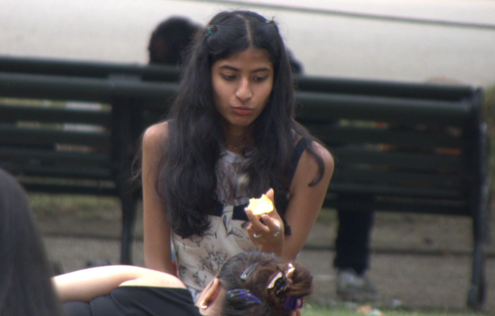 Indian girl munching