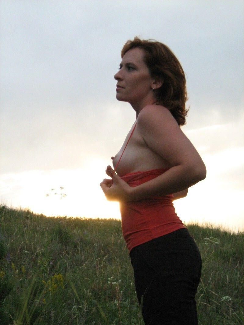 Cute Redhead MILF Posing Outdoors