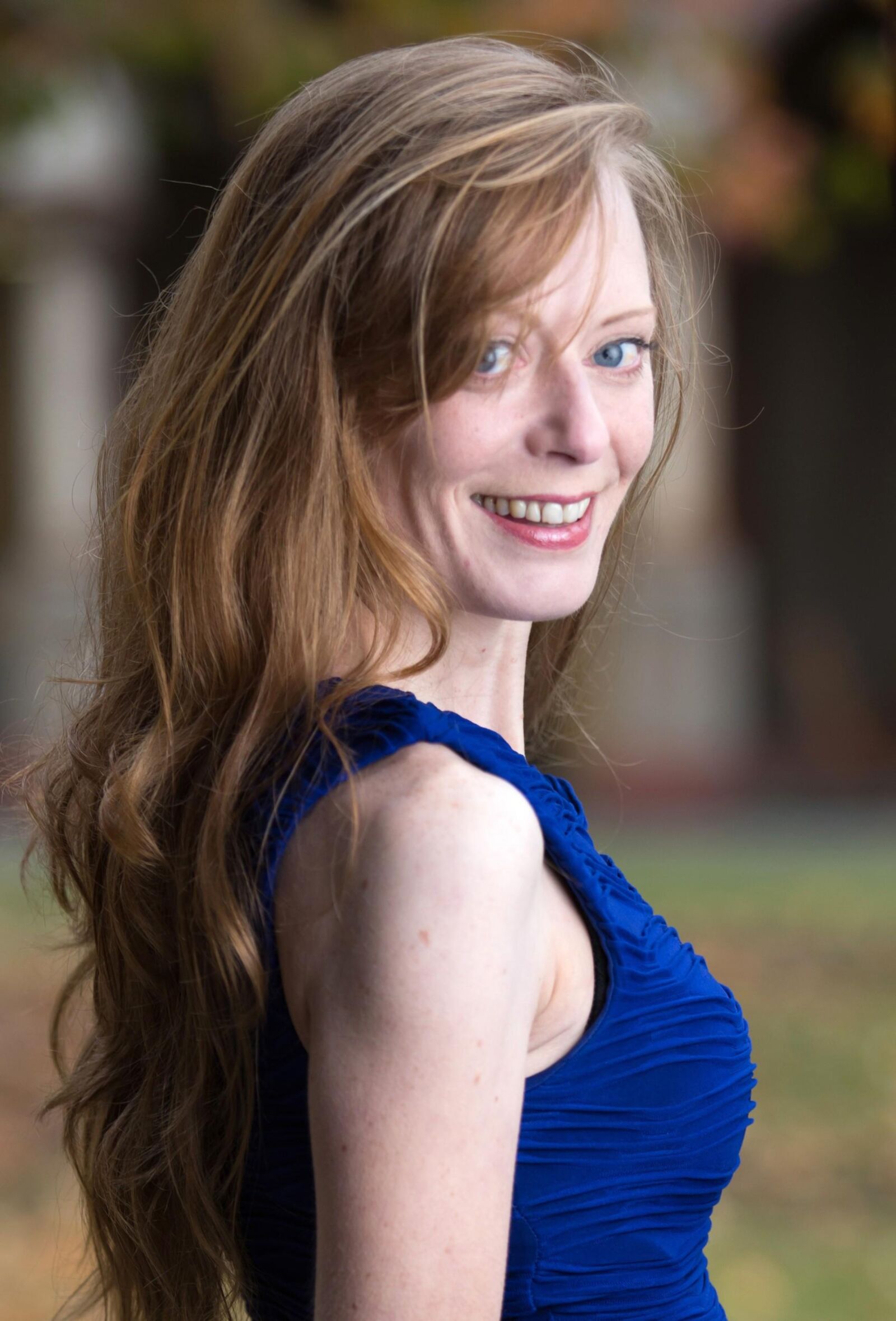 Hot redhead in a blue dress