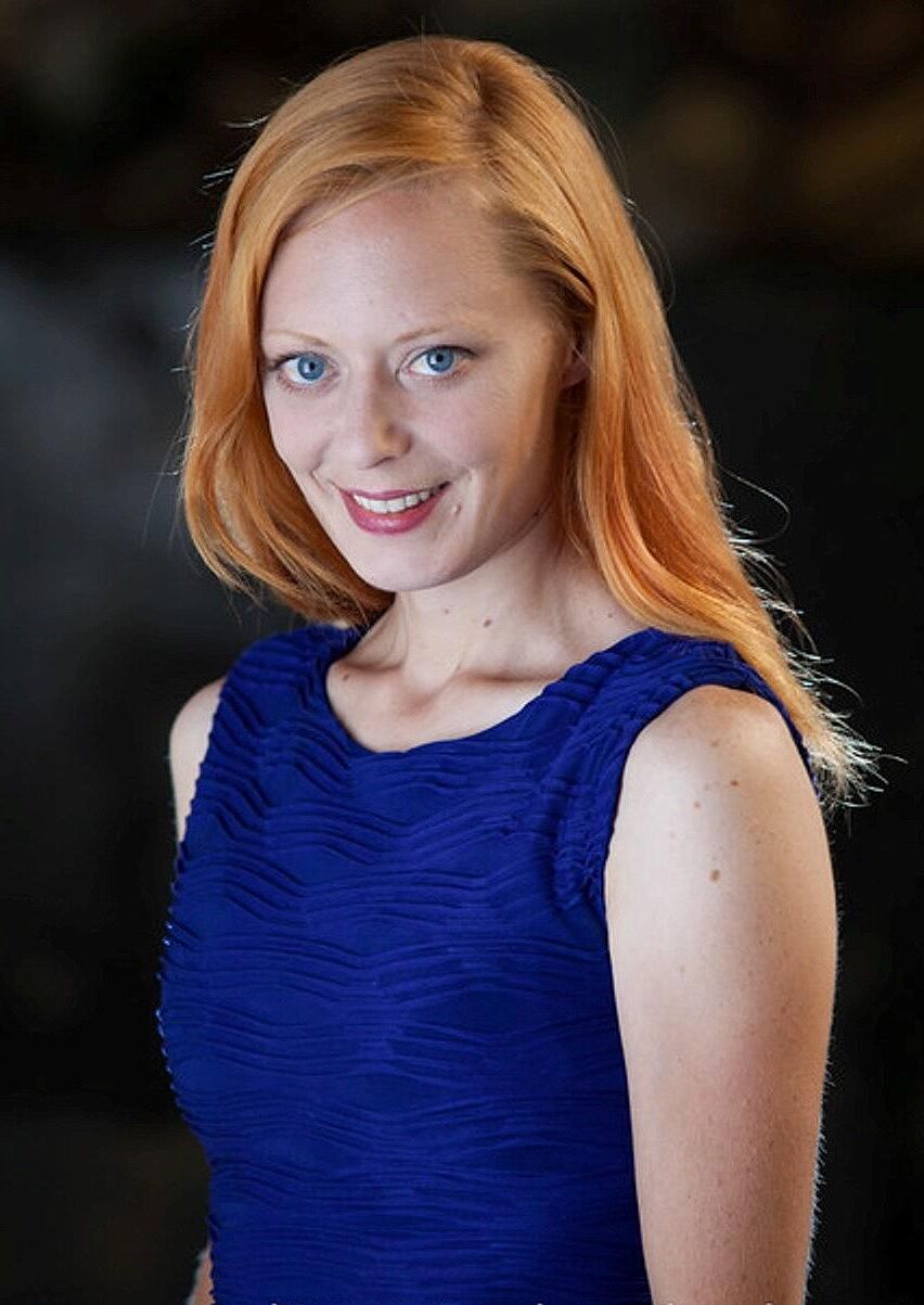 Hot redhead in a blue dress