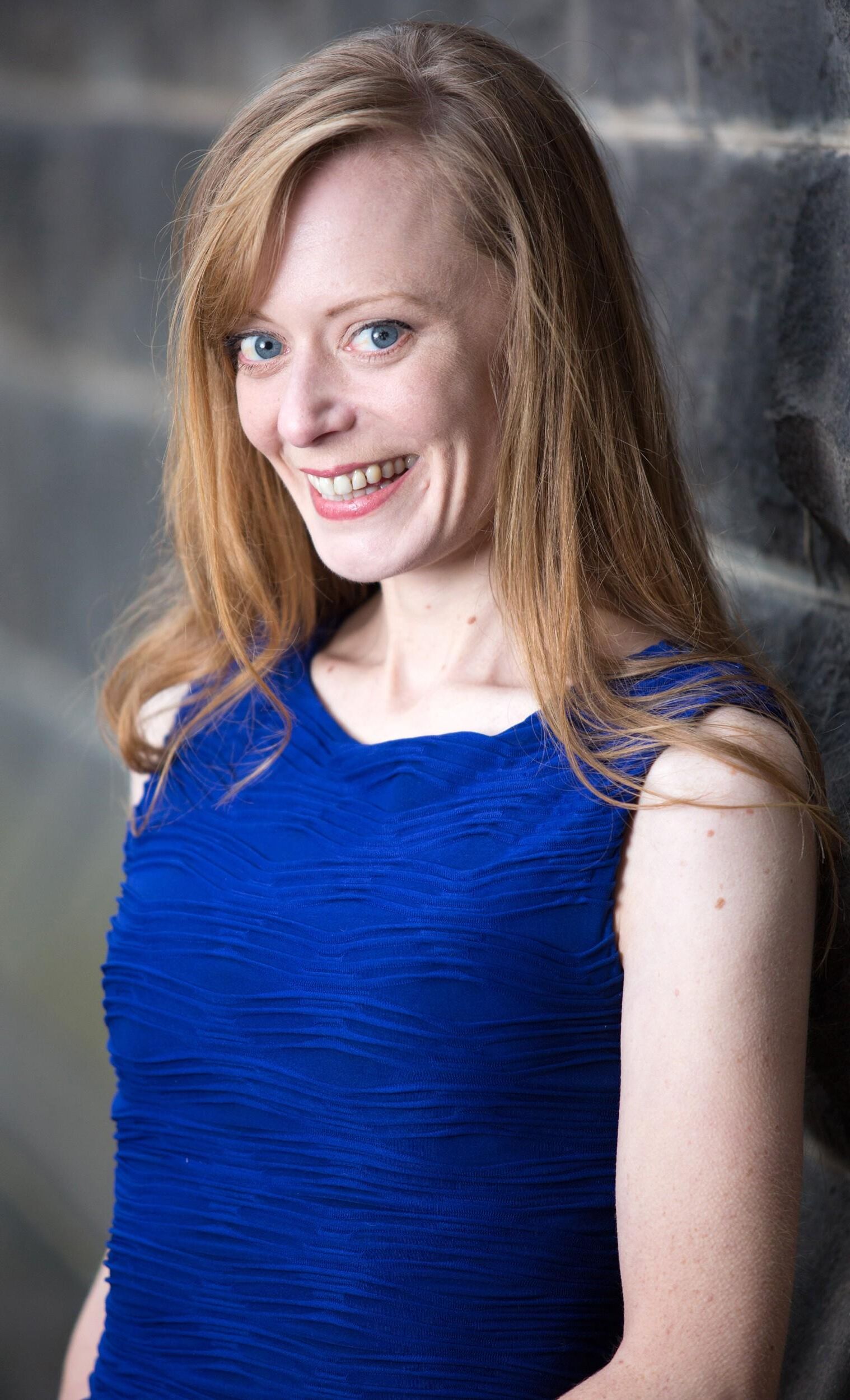 Hot redhead in a blue dress