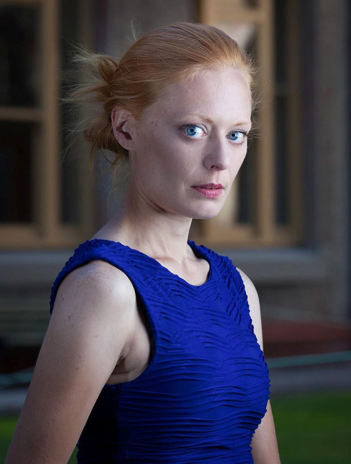 Hot redhead in a blue dress