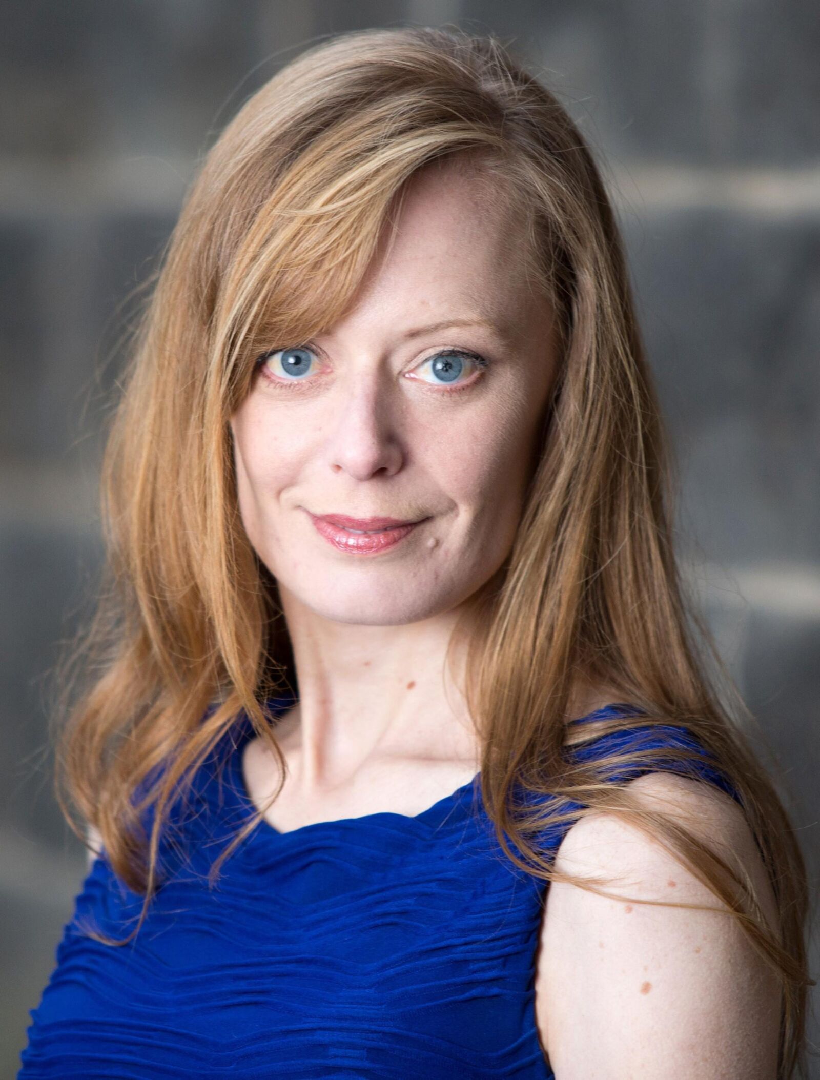 Redhead in Blue Dress