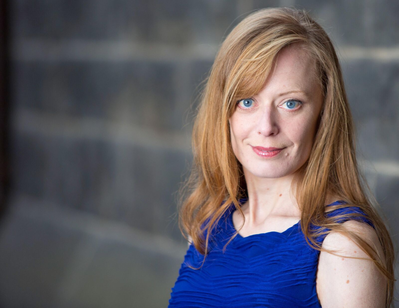 Redhead in Blue Dress