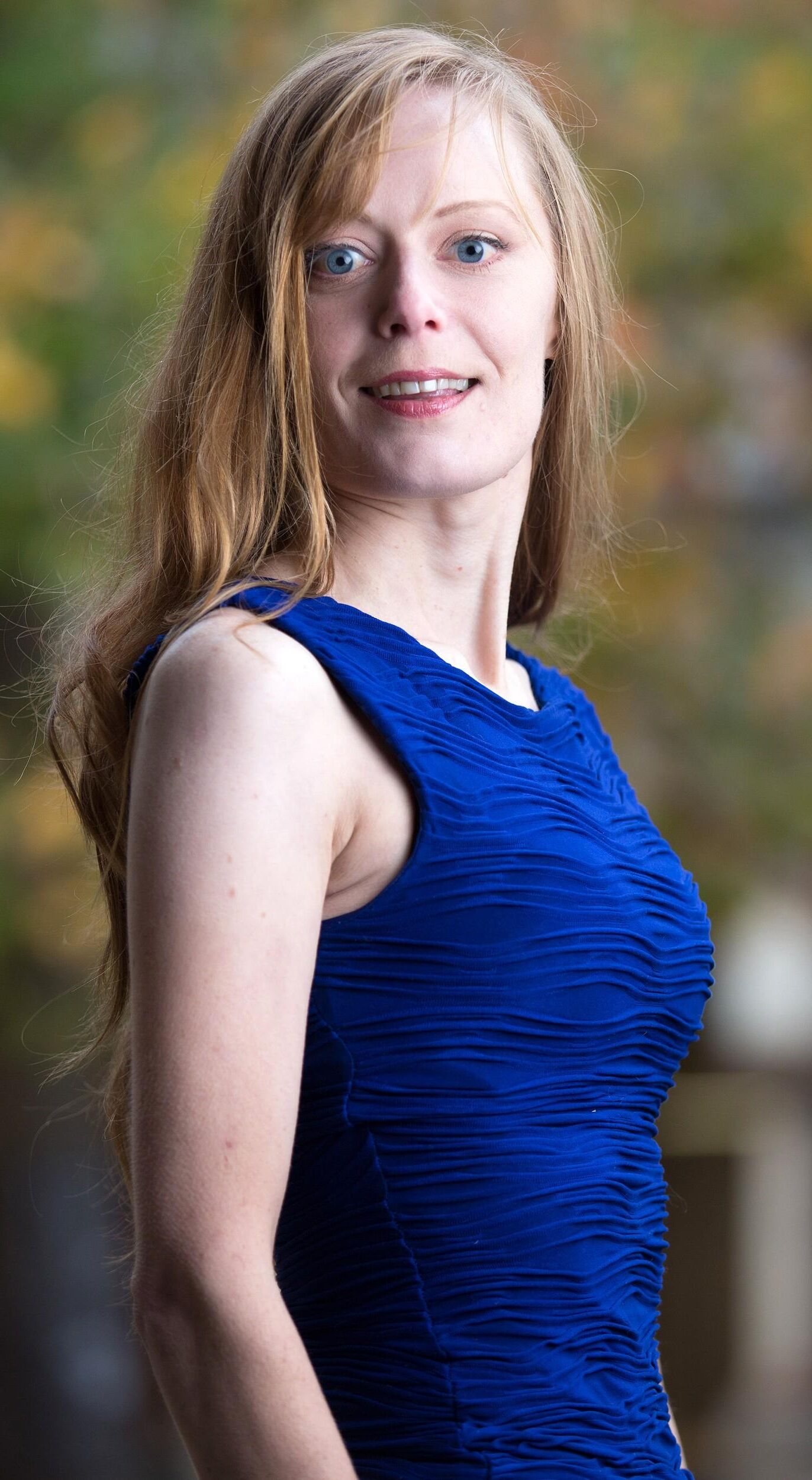 Redhead in Blue Dress