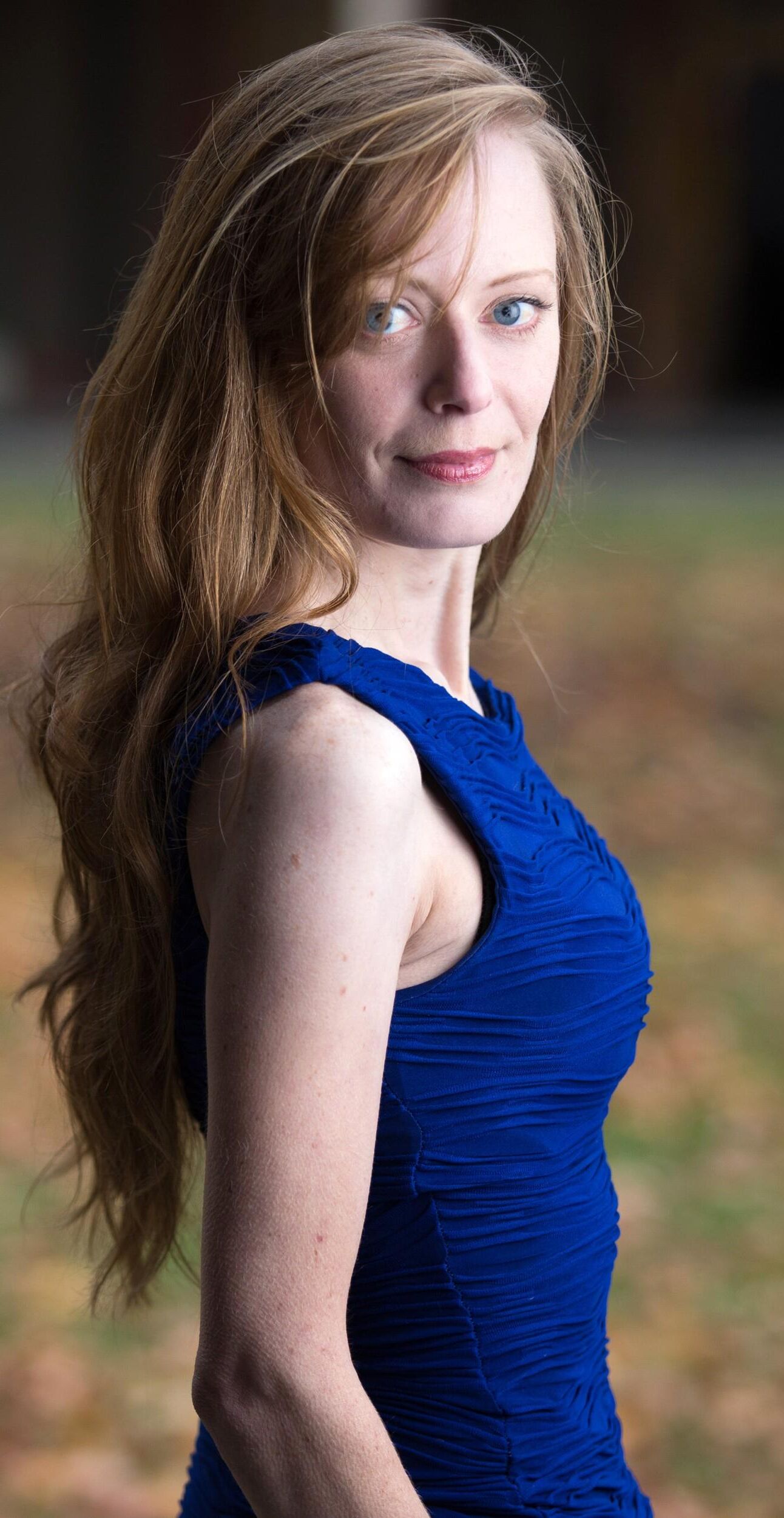 Redhead in Blue Dress