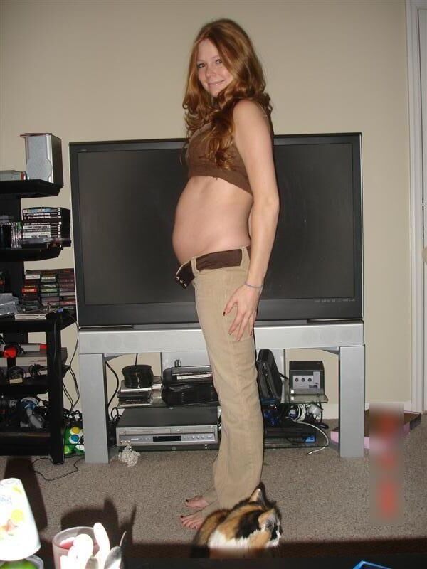 Pregnant redhead