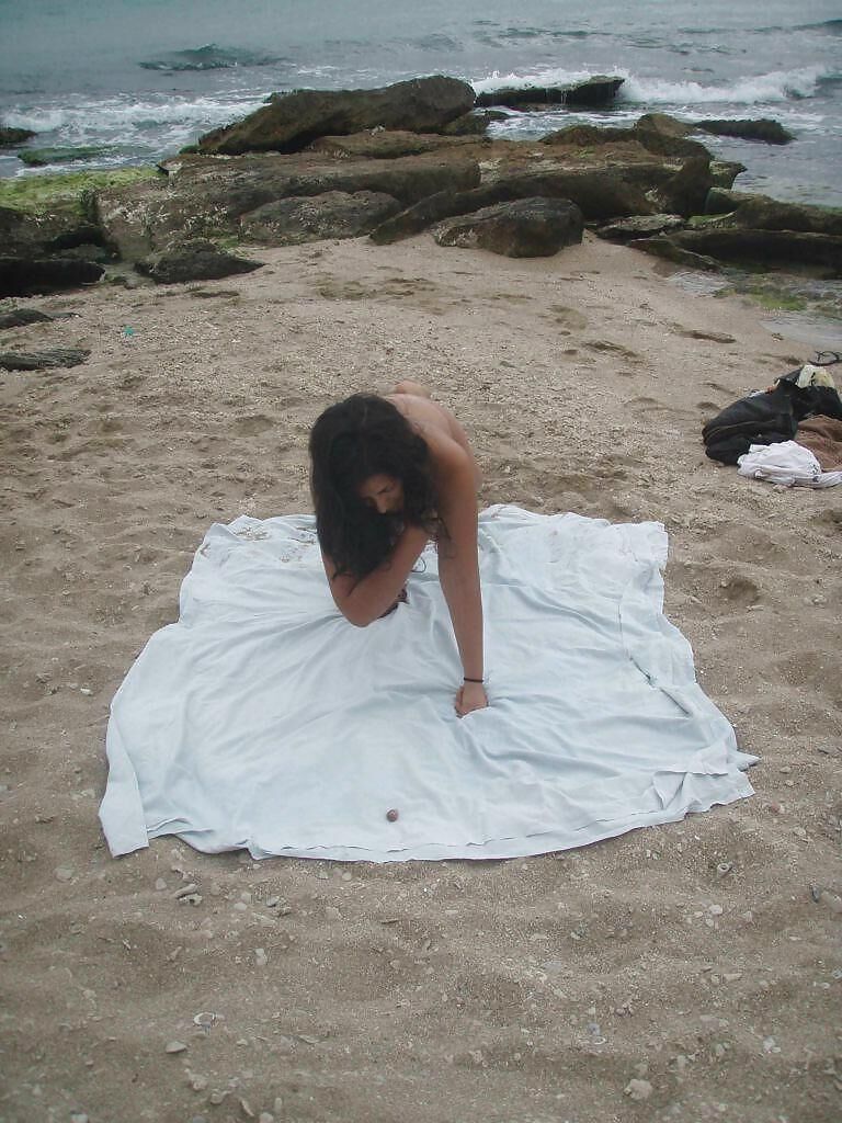 Esposa árabe exposta na praia