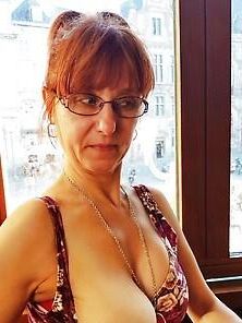 Mature redhead with saggy tits