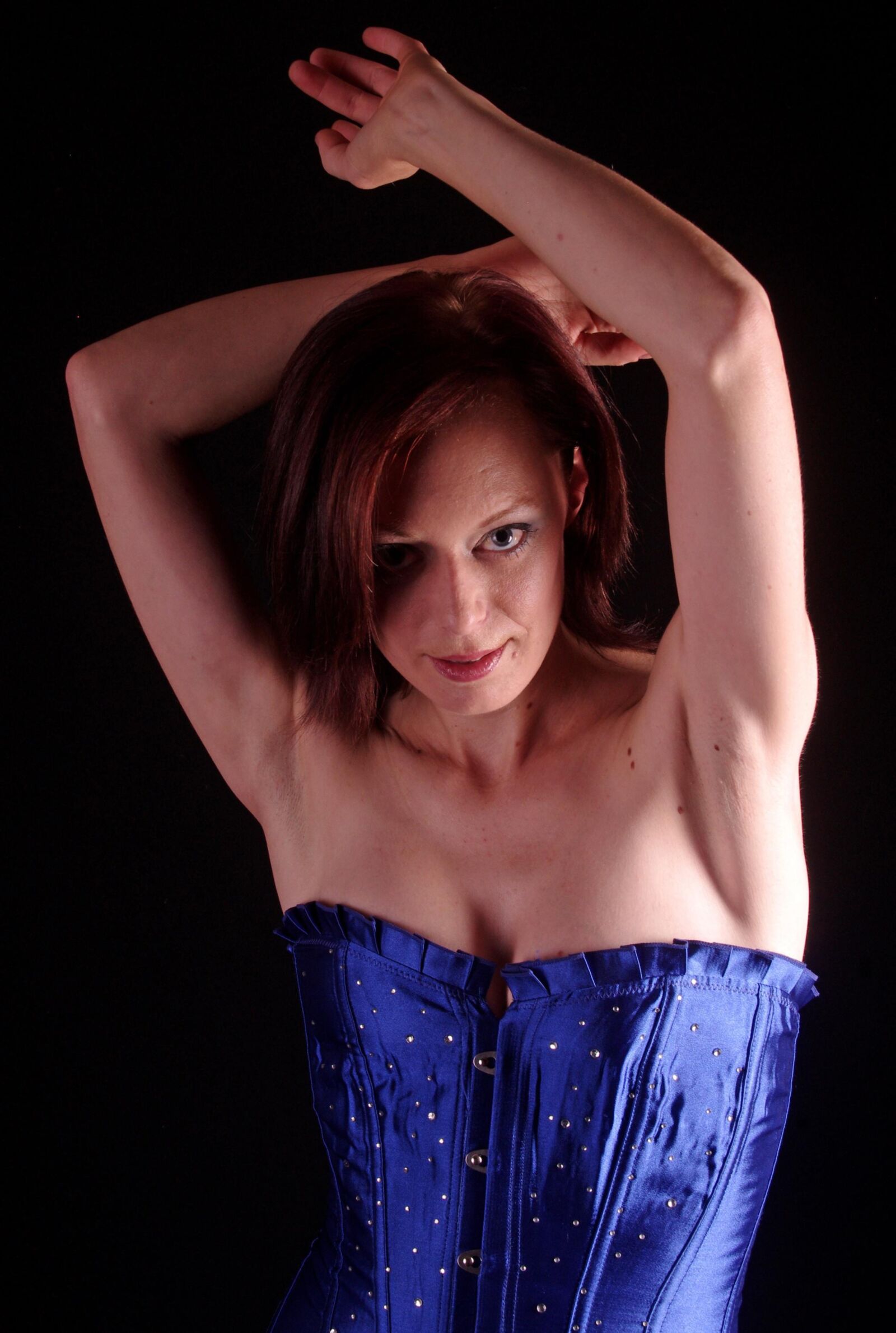 Red headed sub slut in fetish corset