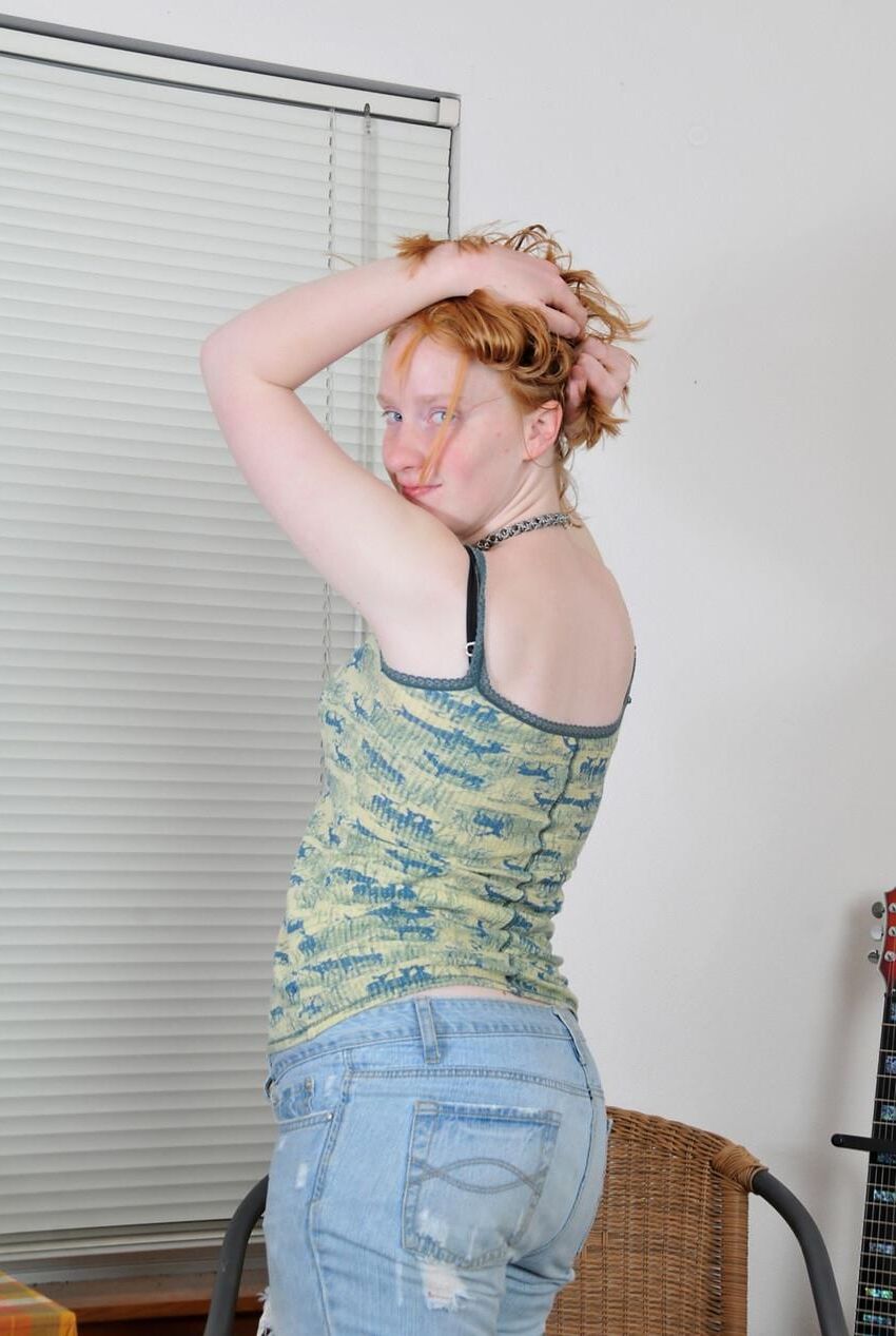 Pale hairy redhead teen with a gorgeous smile sandy