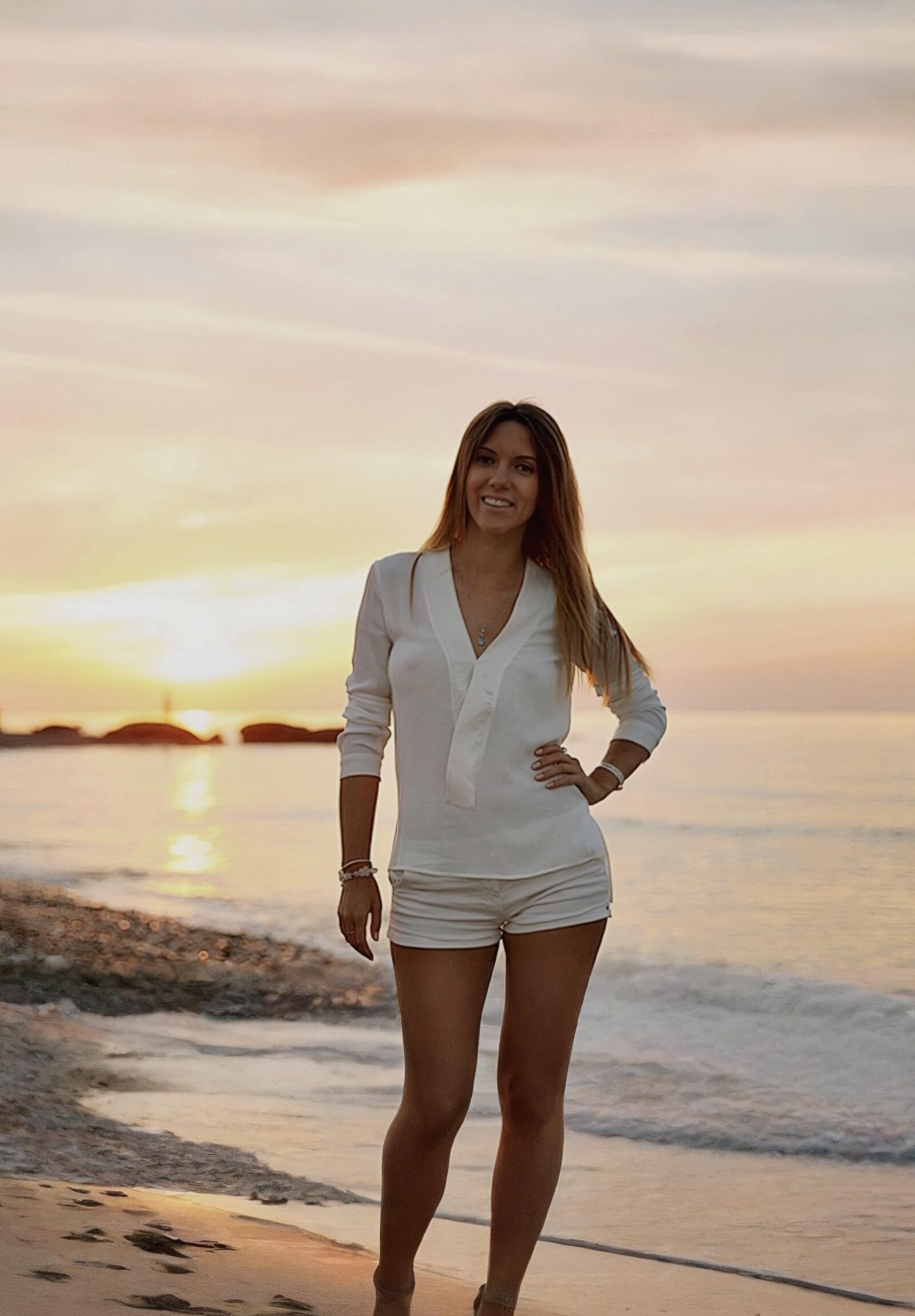 Pretty young Russian wife is posing on public beach 