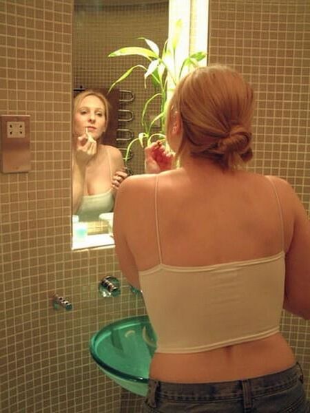 Jessica in her bathroom