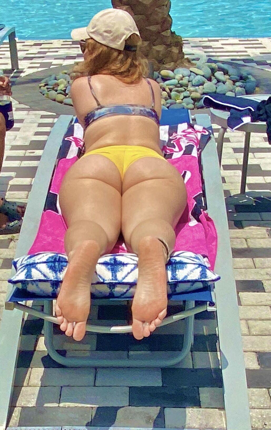 Teen soles at the pool 