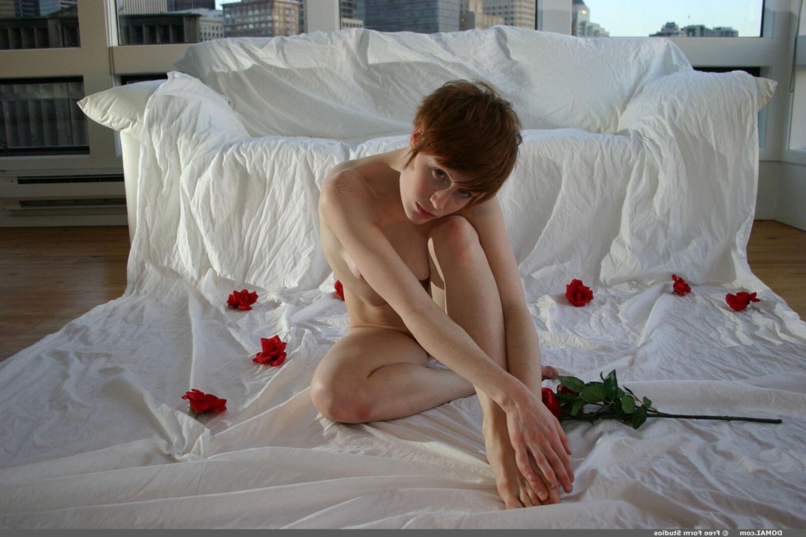 Rosalisa aka Rosette on a white couch