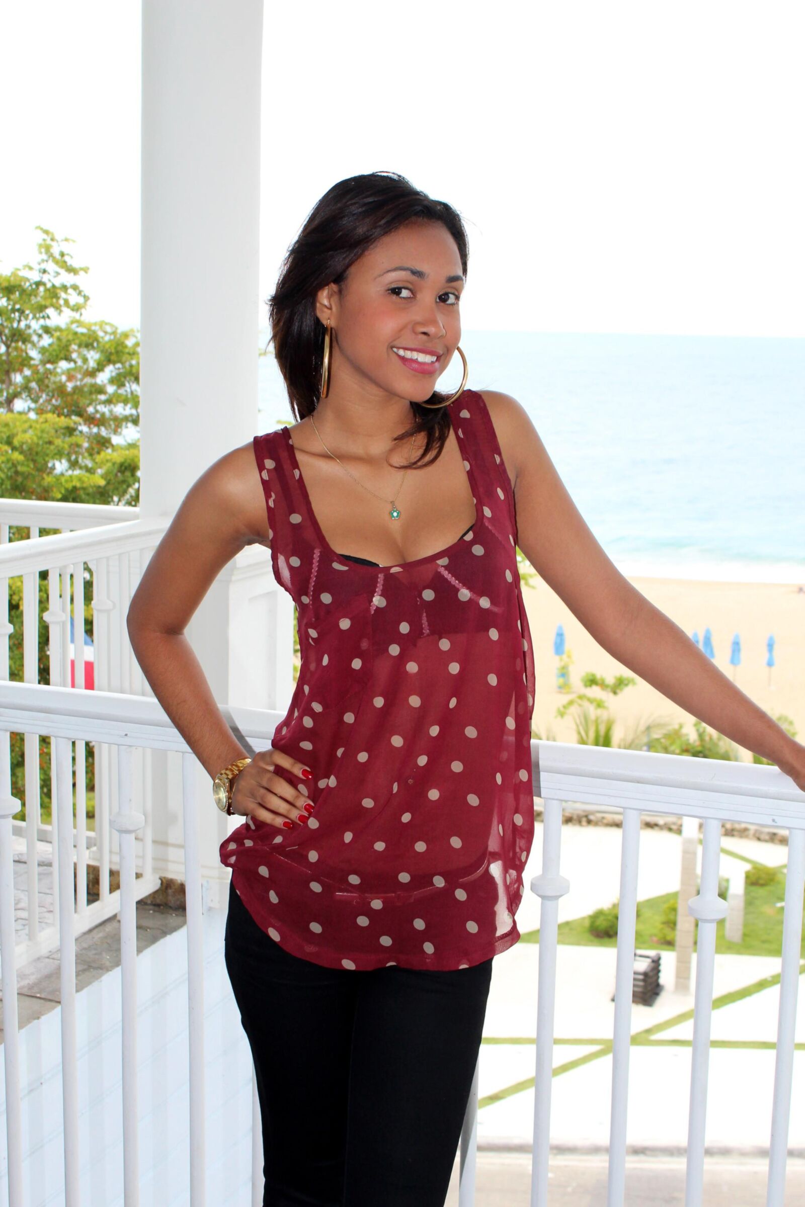 Sexy Slender Latina Removes Her Top and Gets Comfortable
