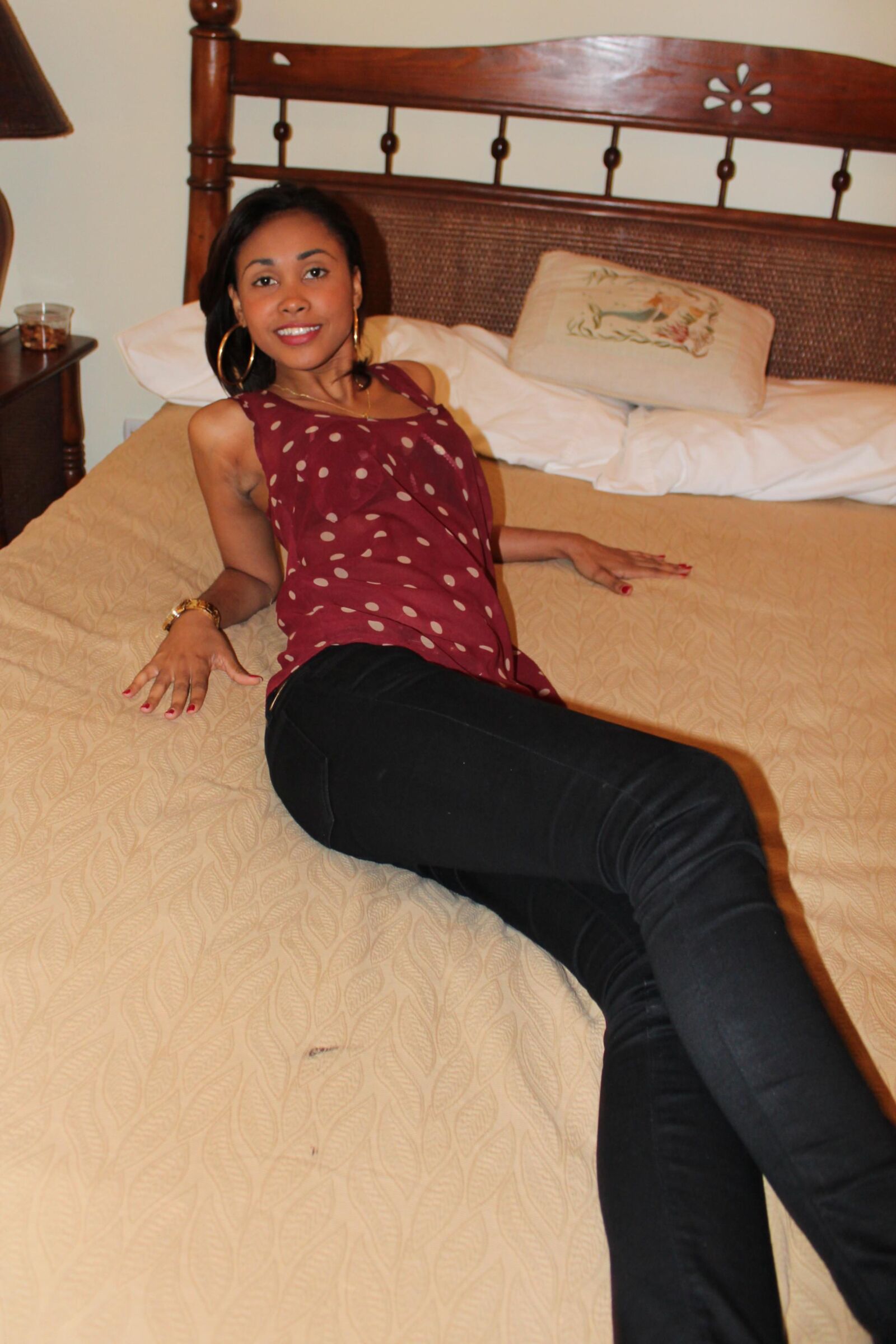 Sexy Slender Latina Removes Her Top and Gets Comfortable