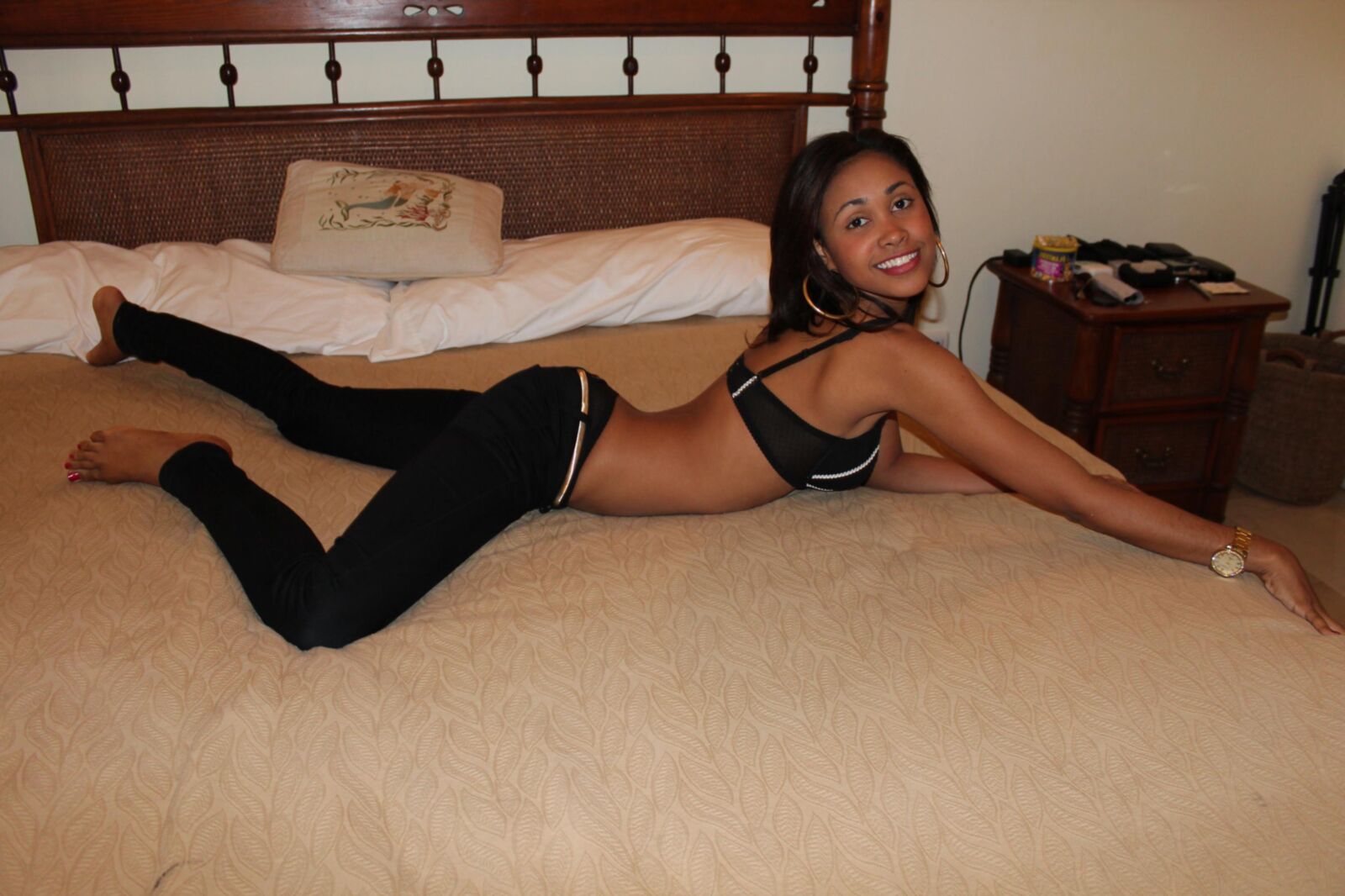 Sexy Slender Latina Removes Her Top and Gets Comfortable